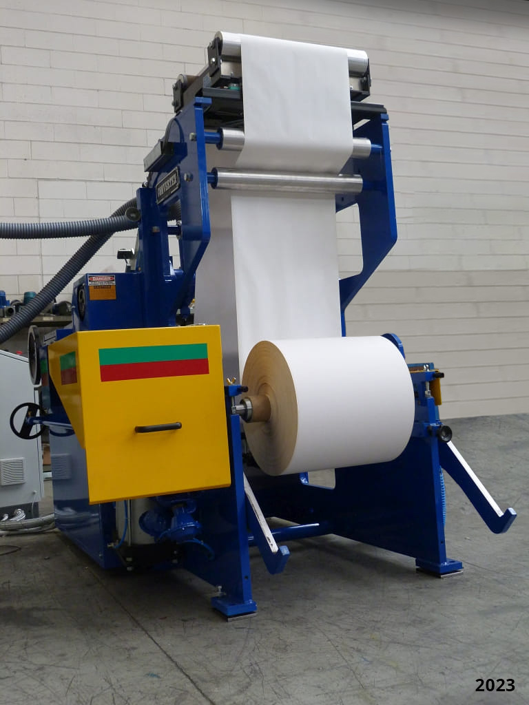 LM-55 (550 mm wide) with Auto-Tucker/Feeder and Auto Edge Guide